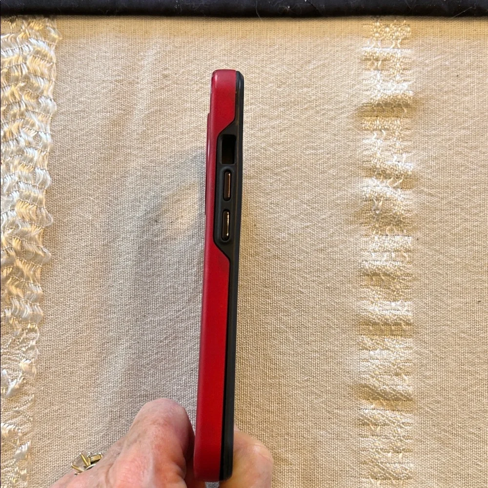 OtterBox Red and Black Phone Case; Fits I phone 15. Used, but still Useful!